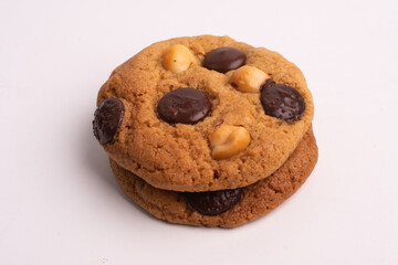 chocolate macadamia soft cookies on white background