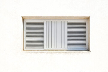 Fototapeta premium White Window with Louvered Shutters