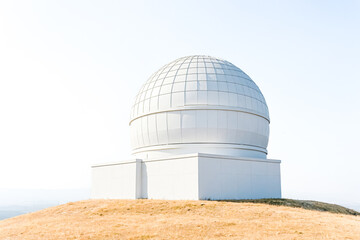 Fototapeta premium White dome observatory on a hilltop