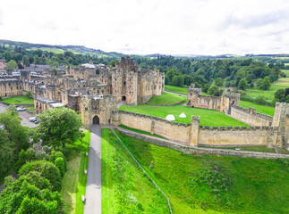 Fototapeta premium Alnwick, Northumberland, UK, June 18, 2024; aerial view of Alnwick Castle, Alnwick, Northumberland, England, UK.