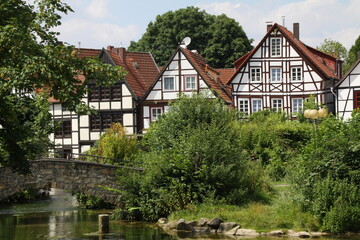 half-timbered houses with springs of the river pader in the foreground, paderborn, nrw, germany,