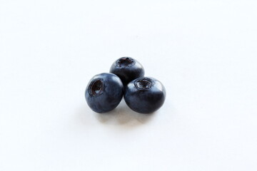 fresh blueberries or bilberry fruit isolated on white background,copy space