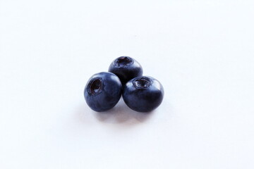 fresh blueberries or bilberry fruit isolated on white background,copy space