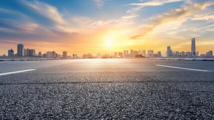 Naklejka premium Cityscape at Sunset with Road in Foreground