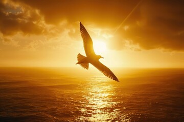 A bird is flying over the ocean at sunset