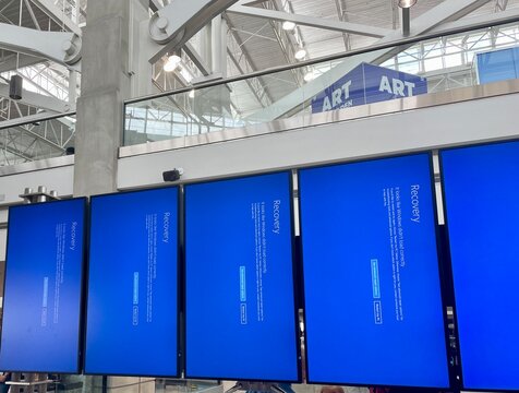A major global system outage has left gate screens blue and blank at the Denver International Airport