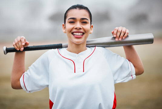 Happy woman, portrait and baseball with bat on turf for game time, match or outdoor competition on field. Young female person or sports athlete with smile for fitness, exercise or softball on pitch - Powered by Adobe