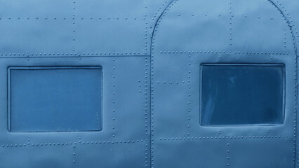 Fragment of the fuselage of an old plane.