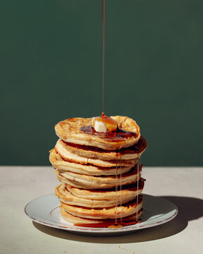 stack of waffles with syrup