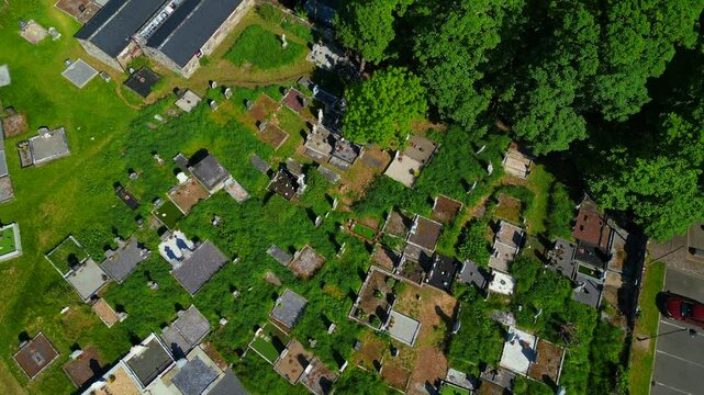 A view of Ireland from the air anda UAV Drone looking at the Famous Drumcliffe Church, Ireland in Sligo where Yeats is buried in his grave