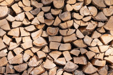A cord of wood to be used for heating a home.