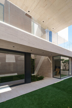 Modern architecture with design in stone, wood and glass