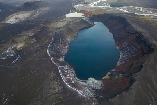 Aerial view of a serene volcanic lake in Iceland