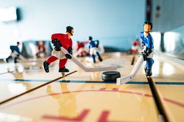Close up table hockey players playing on a game table