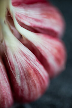 Close-up view of fresh garlic cloves with vibrant colors