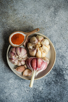 Garlic and spices in rustic kitchen setting