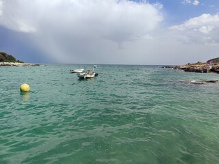 Boats in the bay - blue waters at the Adriatic sea shore - Croatia 