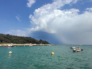 Boats in the bay - blue waters at the Adriatic sea shore - Croatia 