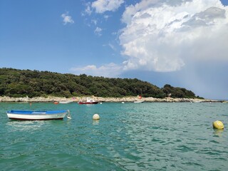 Boats in the bay - blue waters at the Adriatic sea shore - Croatia 