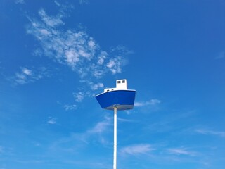 bird house on a blue sky
