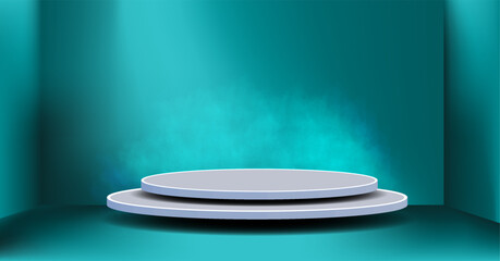 A two-tier circular pedestal sits on a teal floor in front of a teal wall with a light coming from above.