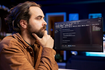 Introspective developer coming up with solutions to futureproof company network from downtimes and...