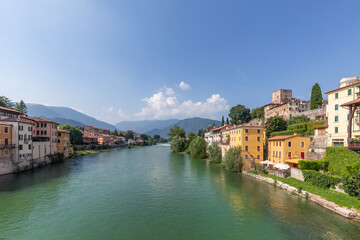 view to historic skyline of Bassano del Grappa with the Old wooden Bridge, also called ponte degli Alpini, Italy
