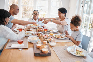 Family, home and dining table for happy lunch, social gathering and brunch sharing meal or grandparents. People, love and woman serving or gourmet nutrition, apartment and together with healthy dish