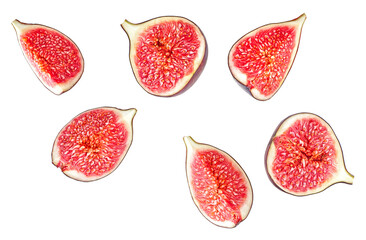 Collection of fresh sliced fig fruits isolated on a white background, top view.