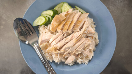 Chicken rice on a plate in a restaurant