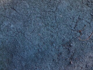 Rough texture background of building wall taken close up. Suitable for additional design projects.