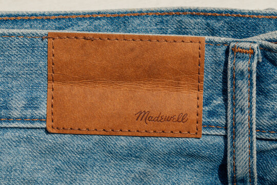 blue Madewell jeans with brown leather tag