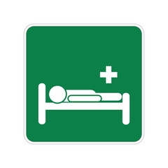 Isolated green sign of hospital, medical facility, first aid center, health clinic with resting patient pictogram