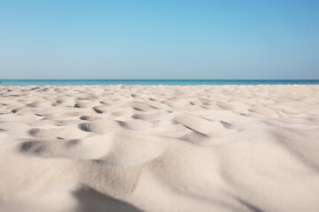 Beautiful sandy beach and sea on sunny day. Summer vacation