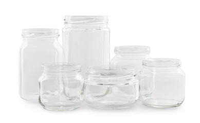 Many empty glass jars isolated on white