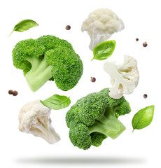 Broccoli, cauliflower, basil and allspice in air on white background
