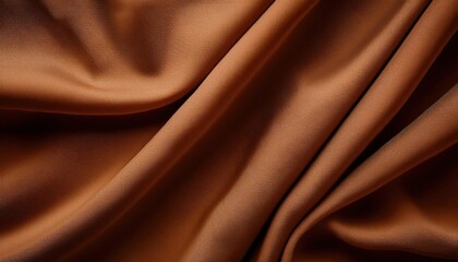 Obraz premium Brown silk fabric texture background.