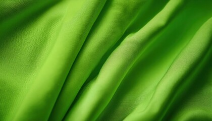 Lime green silk fabric texture background.