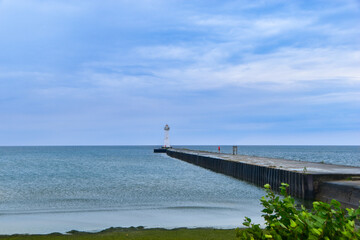 Fototapeta premium Lighthouse pier on the lake