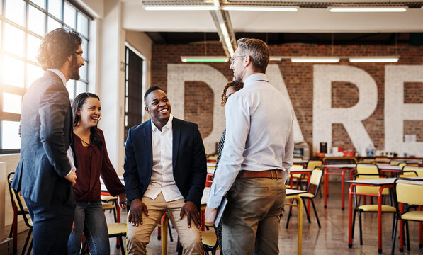 Diversity, talk and team in office cafeteria for meeting, casual chat and brainstorming ideas. People, male leader and social in workplace for inspiration, motivation and story telling in morning