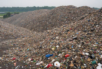  Overflowing landfill overflowing with waste. 