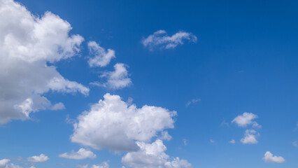 clear blue sky background,clouds with background, Blue sky background with tiny clouds. White fluffy clouds in the blue sky. 