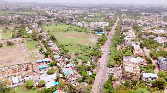 Aerial view of cityscape with major road