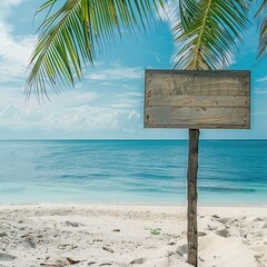 A simple wooden signboard on a palm tree on a white sandy beach, with a clear horizon line and calm ocean waters. 