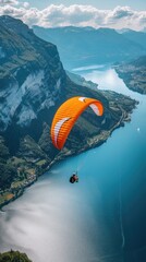 A person paragliding over beautiful mountain scenery.