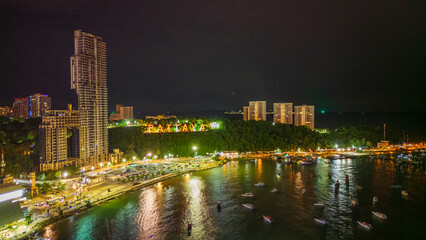 aerial of Pattaya Thailand sign city illuminated at night with skyline cityscape 