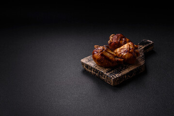 Delicious grilled chicken legs with spices and herbs