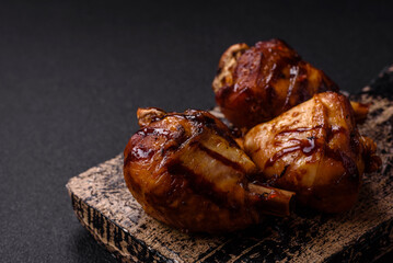 Delicious grilled chicken legs with spices and herbs