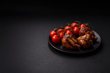 Delicious grilled chicken legs with spices and herbs