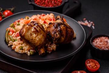 Delicious grilled chicken legs with spices and herbs